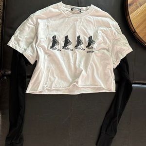 brandy white top with black sleeve